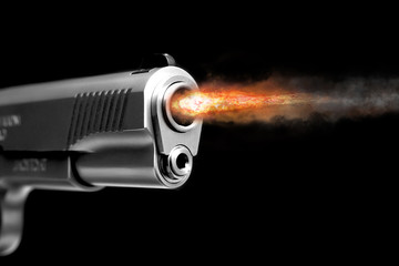 A fire from the gun after the shot. Gunshot