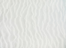 Waves Of White Sand Background