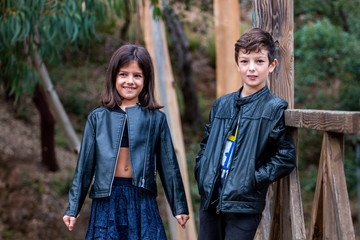 Cute boy and girl posing