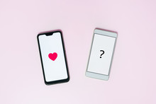 Two Phones With Messaging Icons On Screen. Concept Of Unrequited Love Online. 