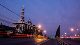 Fototapeta Londyn - The mosque in the morning and evening car lights , lights trails long exposure