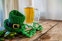 St. Patricks Day Green Shamrocks With A Full Cold Frosty Glass Of Beer   Background