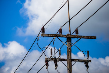 Close-up view of the electricity pole, which is used to transport energy to various cities, in the industry or in lighting.