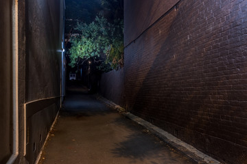 Wall Mural - old alley at night