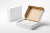 Open and closed white realistic cardboard box with paper and a sticker on a light background. The concept of business gifts. Mock up. 3d rendering