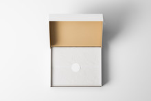 Top View Of An Open White Realistic Cardboard Box With Wrapping Paper And A Sticker On It. The Concept Of Business Gifts. Mock Up. 3d Rendering