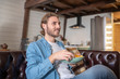 © zinkevych - Man eating junk food while staying at home