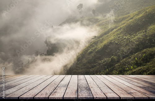 Fotomural Old wood desk or wood floor with landscape mountain views for products display