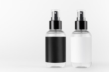 Two Transparent Spray Bottles For Cosmetics Product With Black, White Blank Labels On White Background, Mock Up For Branding, Advertising, Design.
