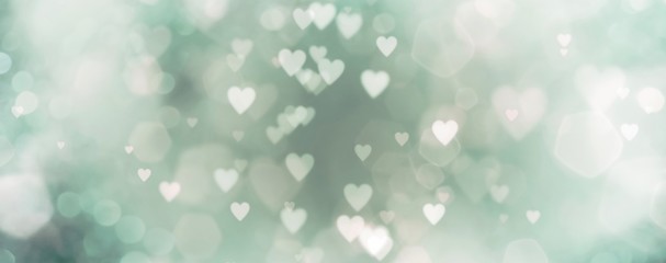 Wall Mural - abstract background with bokeh and green hearts