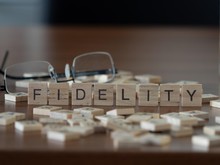 Fidelity Concept Represented By Wooden Letter Tiles
