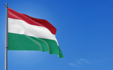 Hungary Flag Waving In The Wind Against Deep Blue Sky. National Theme, International Concept. Copy Space For Text.