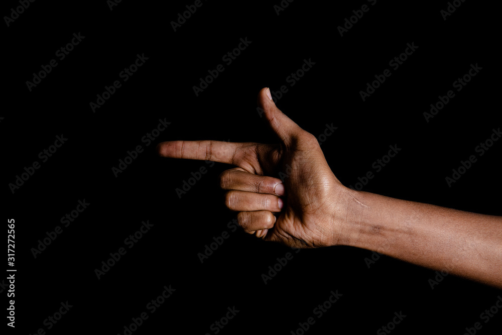 Hand Making Gun Sign Hand making a pistol sign Stock Photo | Adobe Stock