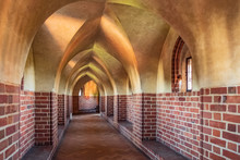 Interior Of The Gothic Corridors  Of The High Castle Part Of The Medieval Teutonic Order Castle And Monastery In Malbork, Poland
