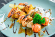 Shrimp and vegetable skewer on grill closeup