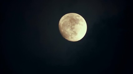 Wall Mural - Big full moon behind moving clouds in 4K 