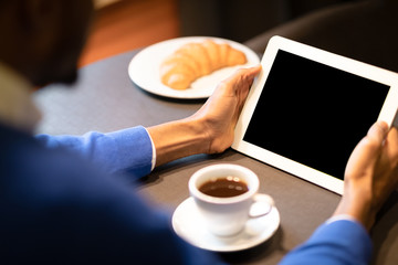 Sticker - Black man with tablet reading news in cafe shop