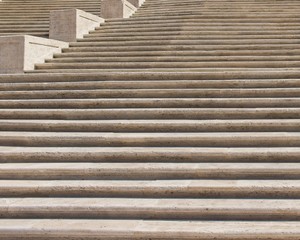 Canvas Print - Low angle shot of a beautiful and old stairway made of stone