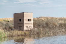 USA, California, Kern County, Kern National Wildlife Refuge. A Hunting And Birdwatching Blind On The Shores Of A Wetland Lake.