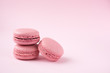 Pink macarons on pink background