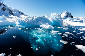 closeup details of iceberg floating in the cold water of antarctica