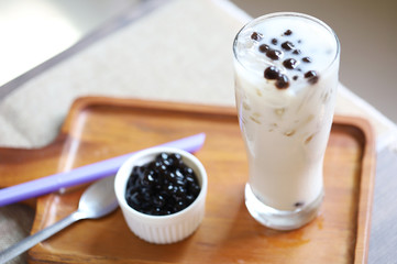 Wall Mural - iced milk tea Taiwan style with bubble boba for refill. Fresh drink in coffee shop