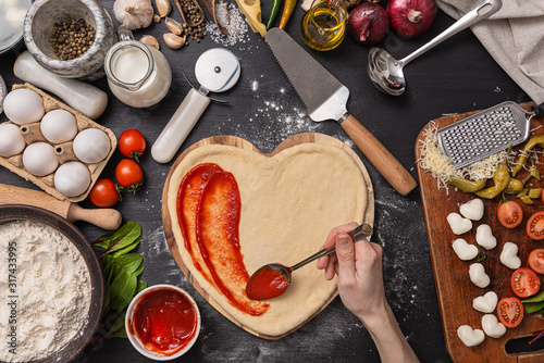 Fotomural woman preparing a festive dinner for two in honor of Valentine's Day classic Ita