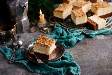 Two color chocolate cake on the dark  background.