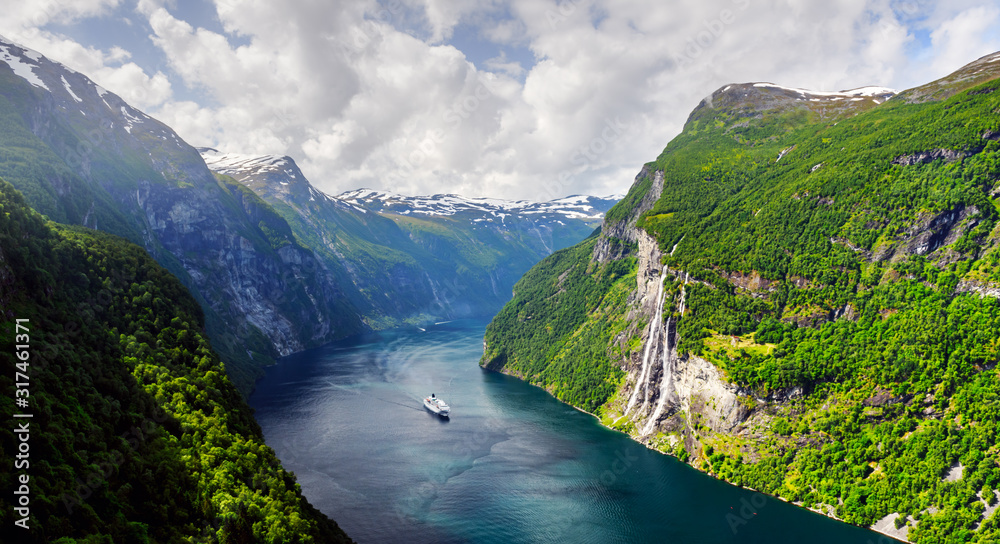 Panorama of breathtaking view of Sunnylvsfjorden fjord and famous Seven Sisters waterfalls, near Geiranger village in western Norway. Landscape photography - obrazy, fototapety, plakaty 