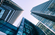 London Docklands skyscrapers. Low, wide angle view of converging glass and steel contemporary skyscrapers.