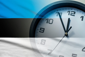 Wall Mural - estonia flag with dial of a clock