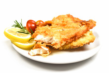 Fried Fish Fillet Sliced For Steak Or Salad Cooking Food With Herbs Spices Rosemary And Lemon - Tilapia Fillet Fish Crispy Served On White Plate