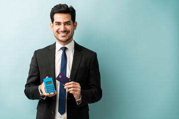 Wall Mural - Salesman With Payment Method Against Colored Background