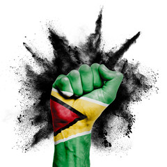 Wall Mural - Guyana raised fist with powder explosion, power, protest concept