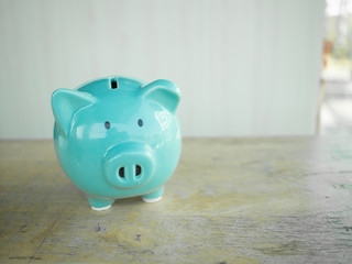 Blue piggy bank with white backgound. space for copy space