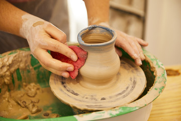 Last moments of molding a pottery