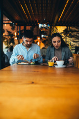 Wall Mural - friends having lunch in restaurant