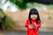 © reewungjunerr - Portrait beautiful asian little girl in Cheongsam dress,Thailand people,Happy Chinese new year concept,Happy Little asian girl in chinese traditional dress