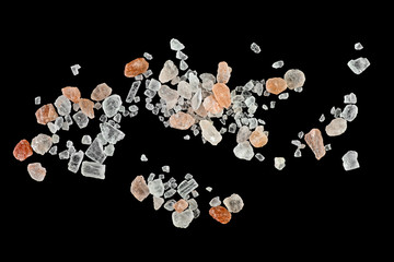 Wall Mural - Himalayan pink salt in crystals on black background, top view.