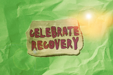 Wall Mural - Word writing text Celebrate Recovery. Business photo showcasing recovery program for anyone struggling with hurt or pain Green crumpled ripped colored paper sheet centre torn colorful background