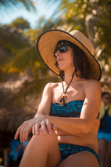 Tela, Honduras »; January 2020: A young woman enjoying the beach of Punta Sal in Tela