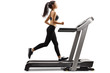© Ljupco Smokovski - Full length profile shot of a young slender woman running on a treadmill isolated on white background