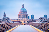 Fototapeta Londyn - St Paul's Cathedral and the Millennium Bridge on a winter morning in London