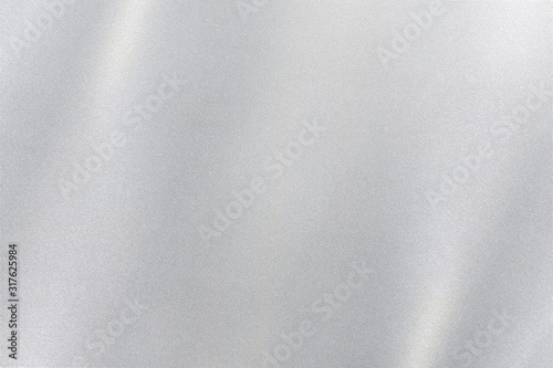 Fotografía Silver foil glitter metal wall with glowing shiny light, abstract texture backgr