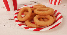 Onion Rings Tasty Fast Food On Red White Striped Plate