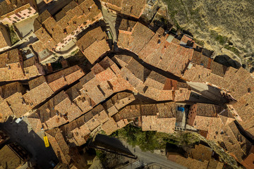 Wall Mural - Aerial top down view of red roof curving streets in Albarracin Spain voted prettiest small town in the country