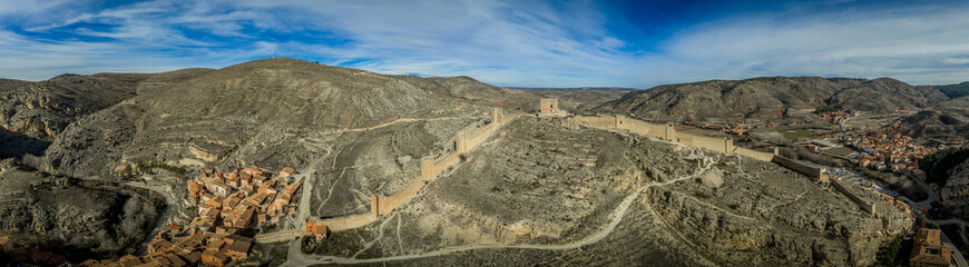 Wall Mural - Aerial panorama view of Albarracin in Teruel Spain, with red sandstone terracotta medieval houses, Moorish castle and ancient city walls  voted most beautiful Spanish village