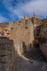 Wall Mural - Aerial panorama view of Albarracin in Teruel Spain, with red sandstone terracotta medieval houses, Moorish castle and ancient city walls  voted most beautiful Spanish village