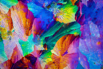 extreme macro photograph of paracetamol crystals forming abstract modern art patterns, when illumina