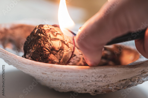 Fotomural White sage burns for a spiritual cleansing practice